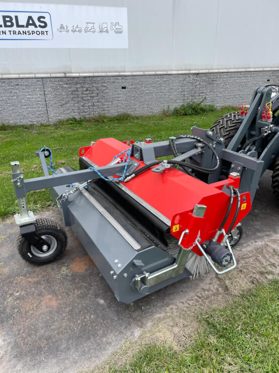 Borstelveegmachine met opvangbak